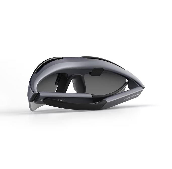 Black sunglasses with a reflective lens on a white background