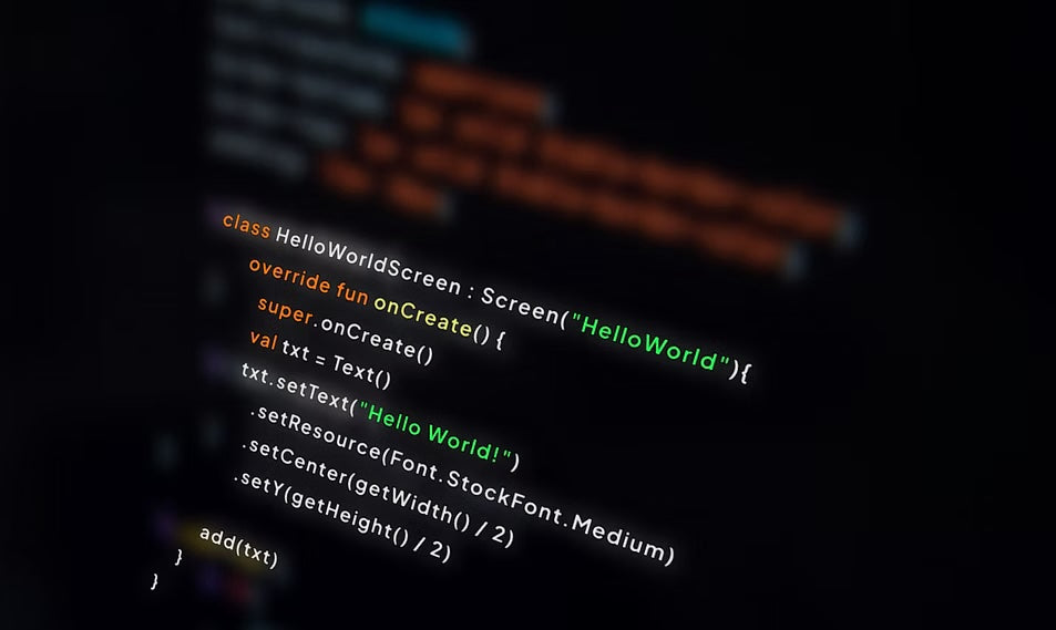 Computer screen showing code with "HelloWorld" messaging