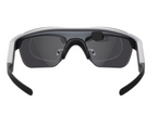 Sunglasses with a black frame and dark lenses on a white background