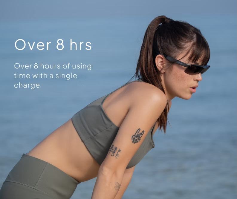Woman wearing maverick glasses with "Over 8 hours" battery life overlay